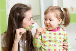 Mother_Teaching_Daughter_Brush_Teeth