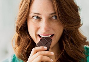 happy-woman-eating-chocolate-0710-410x290